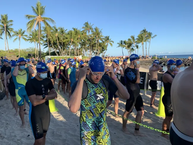 Swim caps and goggles: getting ready for the ocean.