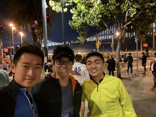 Together before dawn, back at a marathon start line.