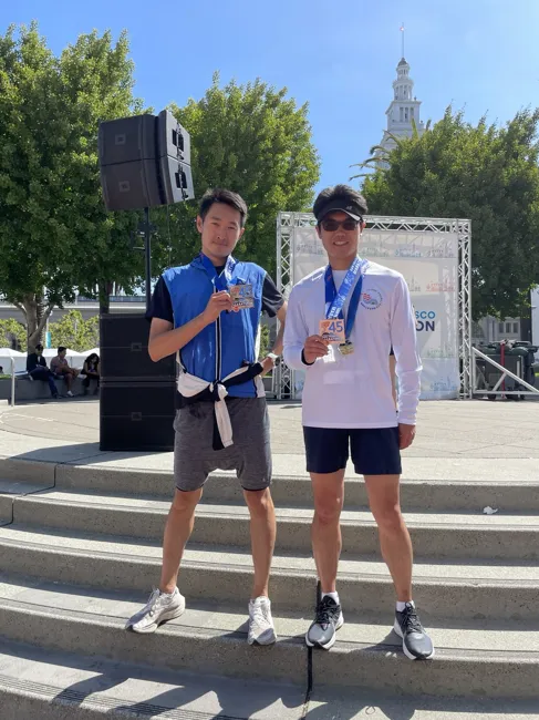 Finisher medals and a shared morning in San Francisco.