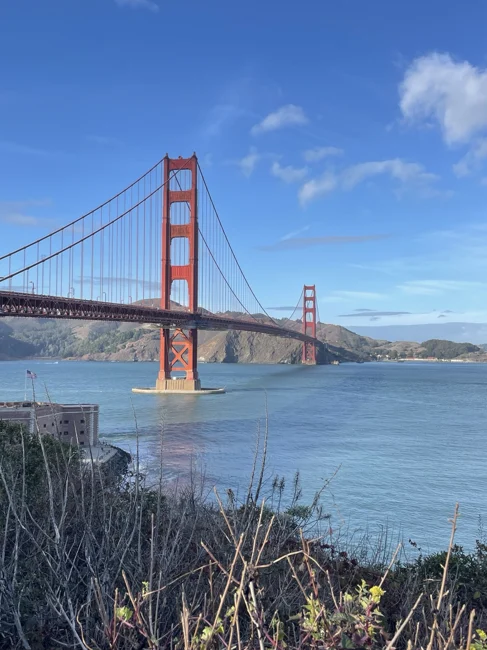 The Golden Gate Bridge, seen from the water’s edge.